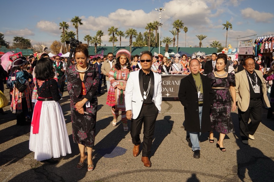 Community members walking the fairgrounds together at the Big Fresno Hmong New Year.