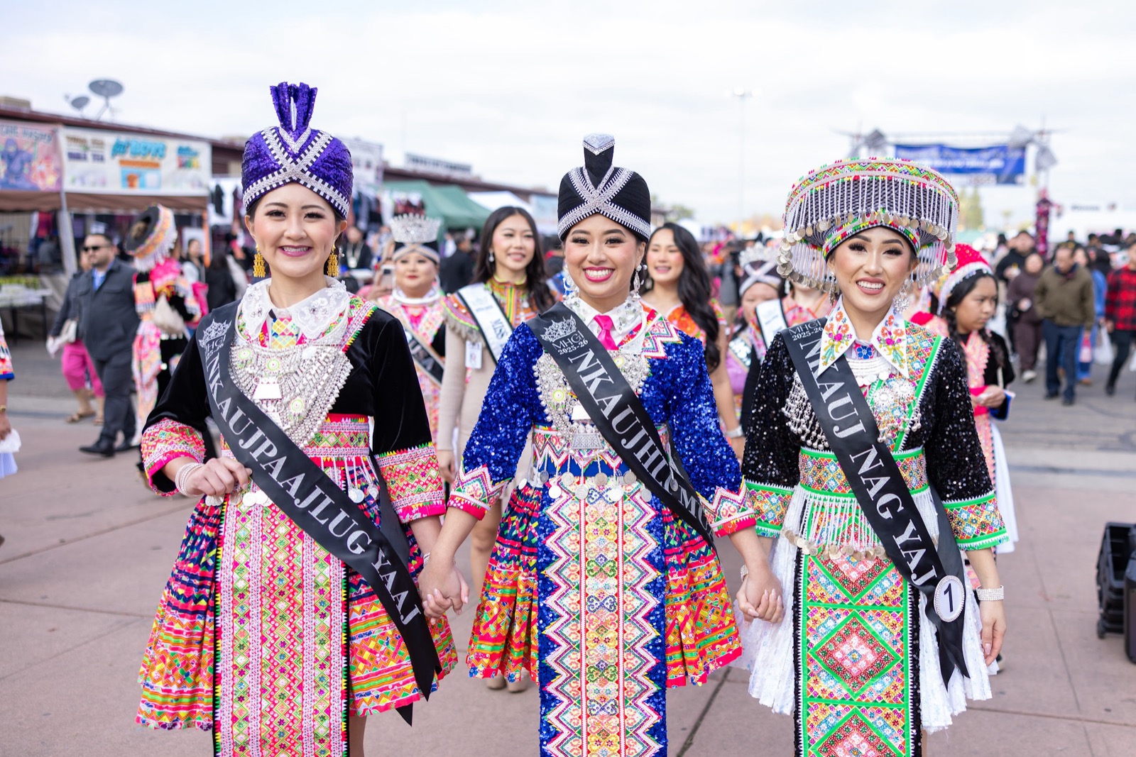 Miss Hmong Grand International titleholders in full dress at the festival.
